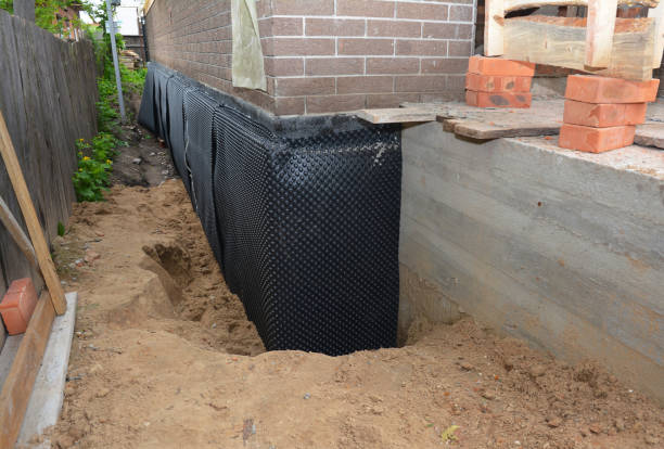 SJ Waterproofing Pros technician performing targeted Emergency Waterproofing assessment in Frankfort, IL